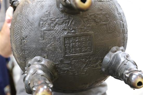 A rare Chinese archaistic bronze censer and cover, Xuande fifteen character mark but 19th century, H. 62.5cm
